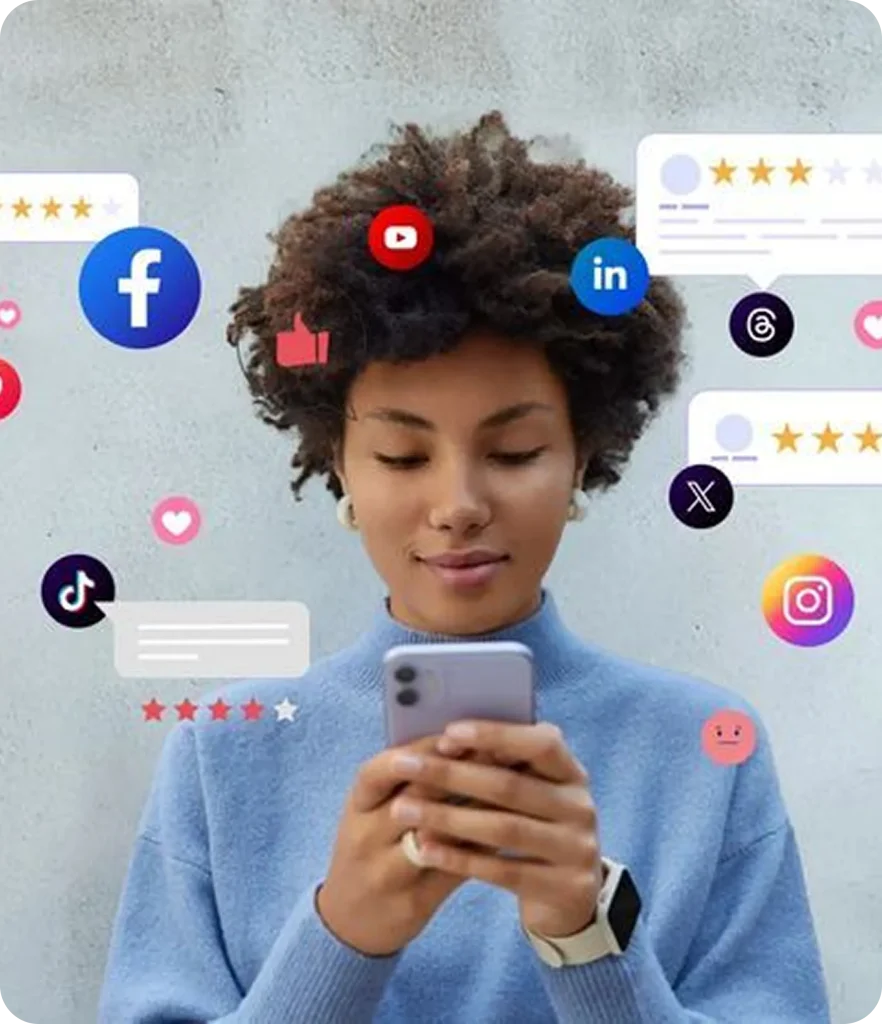 Woman using a smartphone while surrounded by floating social media icons, reactions, and star ratings, representing online engagement, reviews, and digital marketing interactions